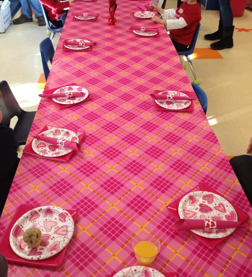 TIP: Can't find a stylish disposable table cloth?  Use wrapping paper!  The lightbulb turned on when I walked through the gift wrapping aisle at the store.  There is a wide variety of colors and patterns... Plus it costs less than plastic table cloths. 